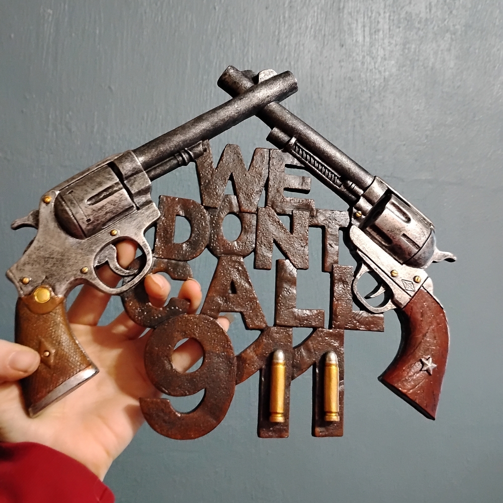 Decorative Metal Wall Art with Revolvers